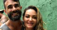 Laura Keller coloca barrigão para jogo em clique com o esposo - Instagram