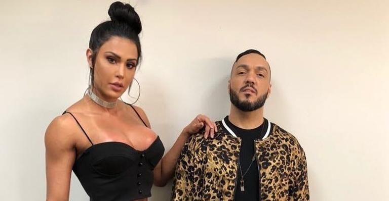 Belo surge beijando Gracyanne Barbosa em vídeo e se declara: ”Por onde for quero ser seu par”