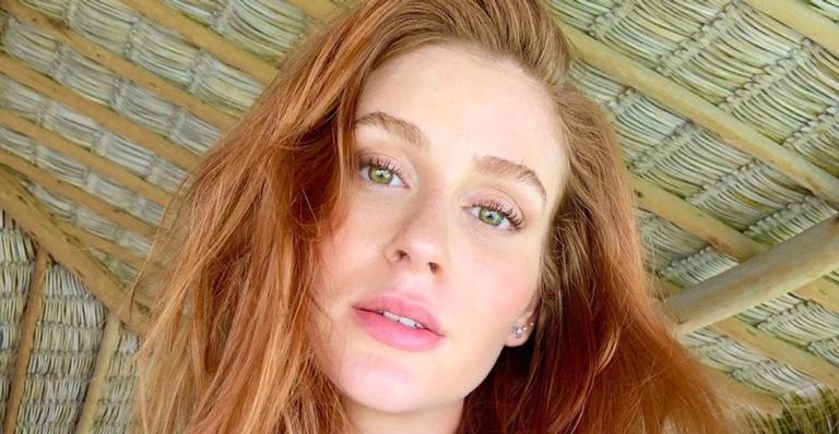 Marina Ruy Barbosa bota corpão para jogo em clique com lingerie decotada