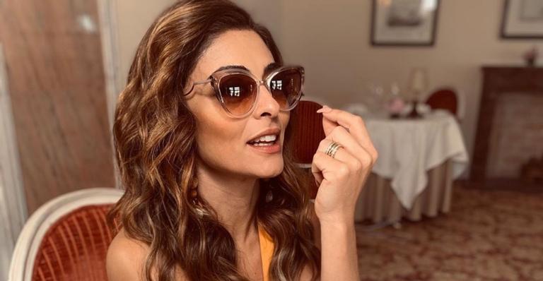 Juliana Paes e Reinaldo Gianecchini beijam muito e aparecem com a boca borrada de batom