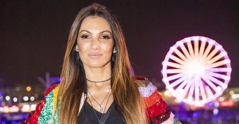 Em aparição rara, Patrícia Poeta aproveita Rock in Rio ao lado de seu filho